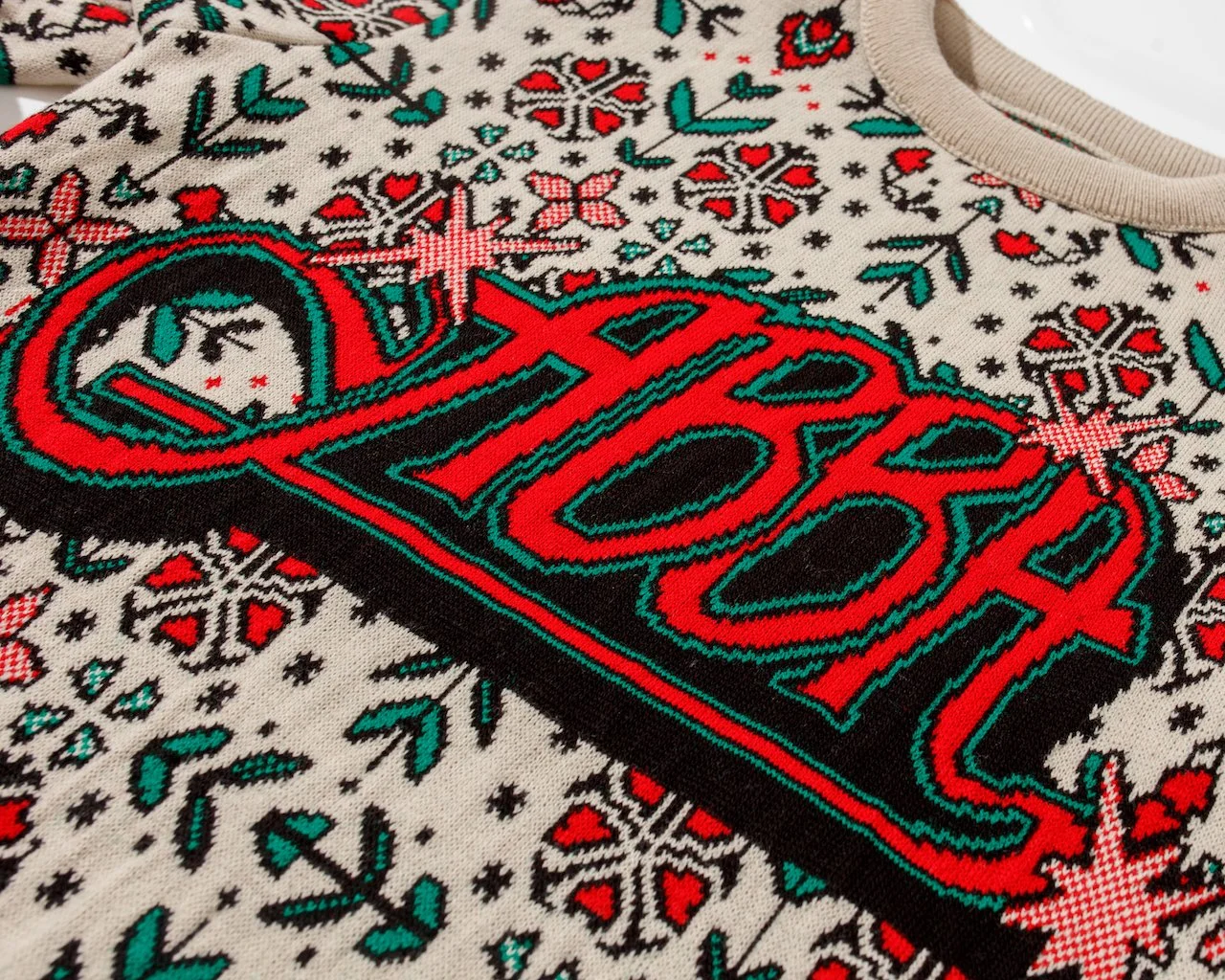 ABBA White Jumper Logo Detail Shot.jpg