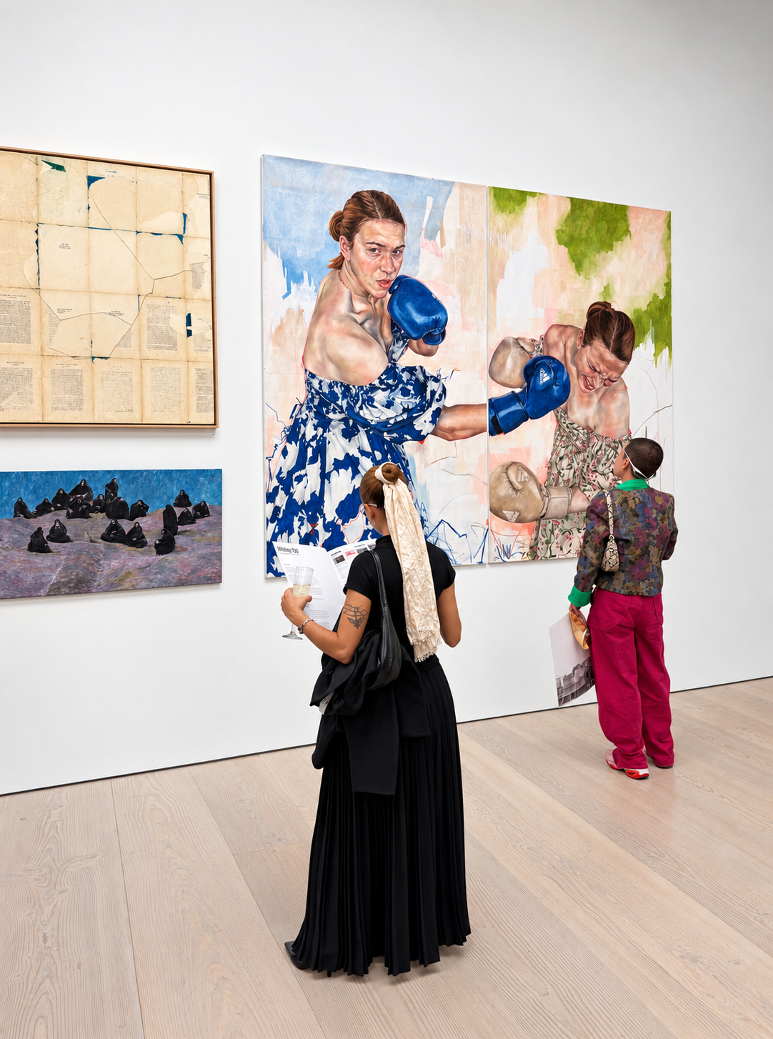 Two women and a young girl in an art gallery, observing large paintings on the wall. One woman with a black dress and sunglasses holding a glass, the other girl in colorful attire, and a woman in the painting with boxing gloves and a dress, painted as part of the artwork.
