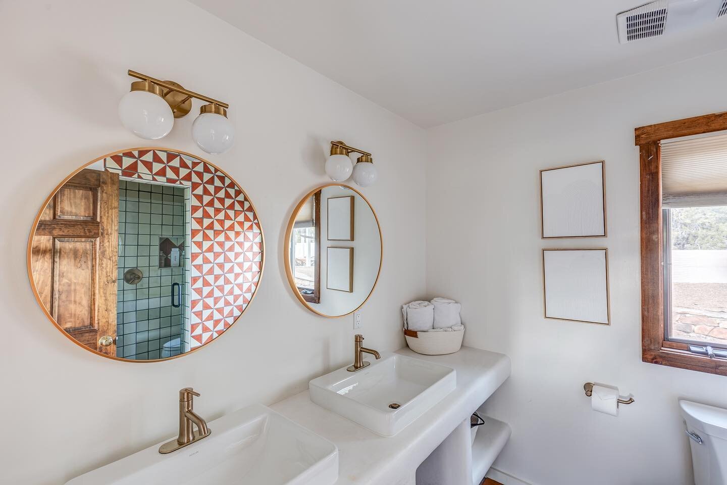While renovating, it was 
important to us to infuse the spirit of the Southwest while making each space more modern. This bathroom has hand painted talavera tiles and a custom plaster vanity with Delta faucets.

#santafe #newmexico #adobe #boho #adob
