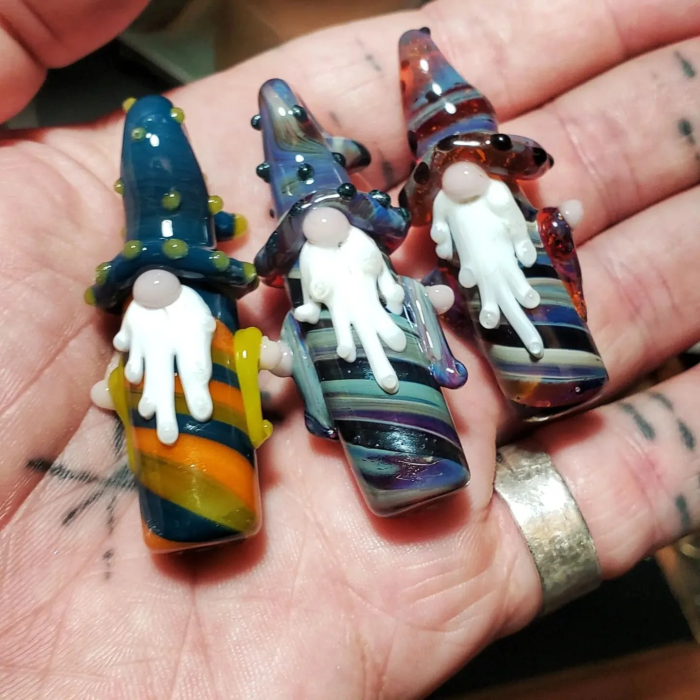 Making a batch of Gnome Wizard pendants for this weekends Local Con at @theaccelerateddragon_phoenix  come check out all the groovy stuff this weekend at your local game and new age store. Sageglasscuriosities.com #boro #lampwork #witchy #wizard #gno