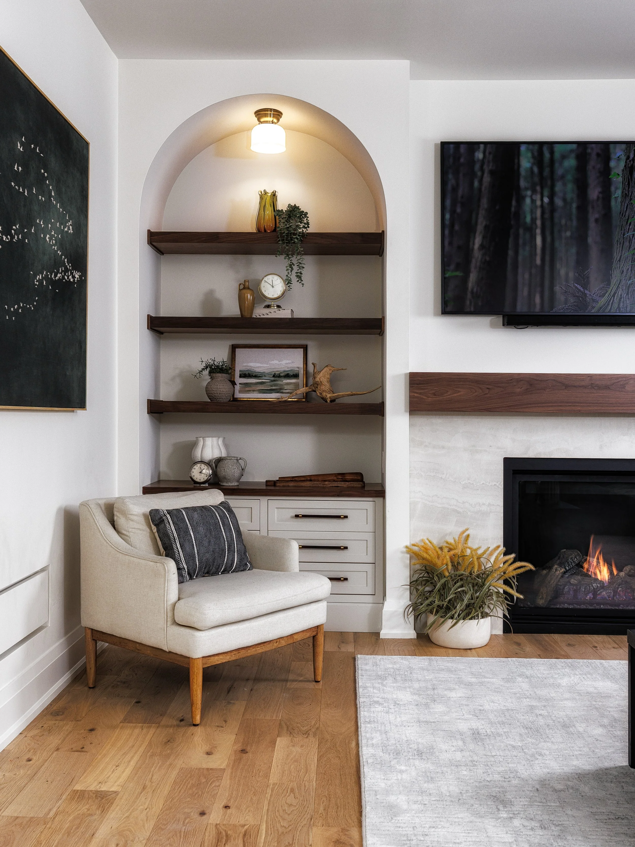 CONTEMPORARY COASTAL | Nothing transforms a space more than custom millwork&hellip; 

Beyond adding storage, built-ins create balance, compliment the architectural features, and give this room a greater sense of cohesion. In this living space, the fi