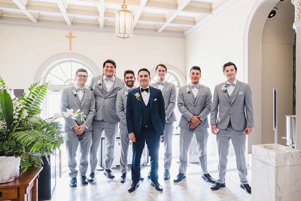 Groom and groomsmen at St. John's Catholic Newman Center Wedding