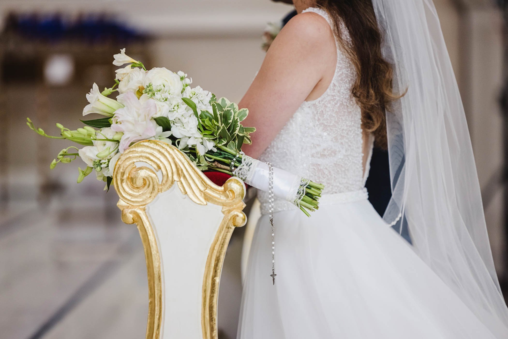 Rosary on bridal bouquet