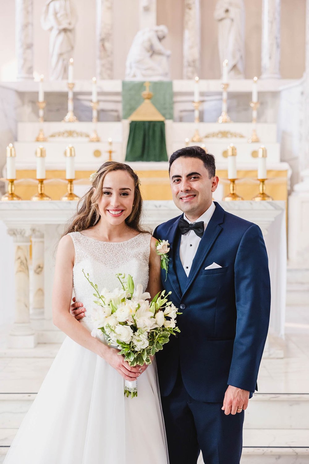 Bride and groom at St. John's Catholic Newman Center Wedding