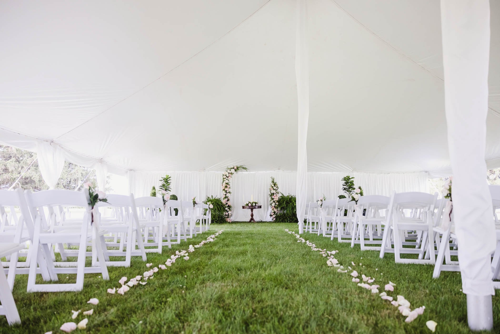 White tent wedding ceremony