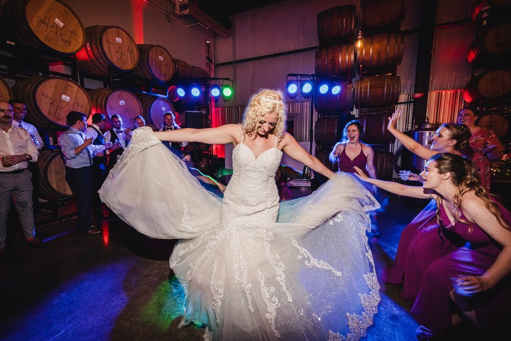 Bride dancing at Destihl Brewery Wedding Reception