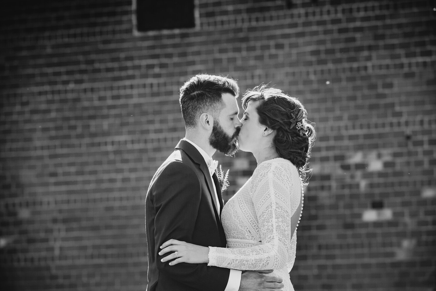 Bride and groom kiss