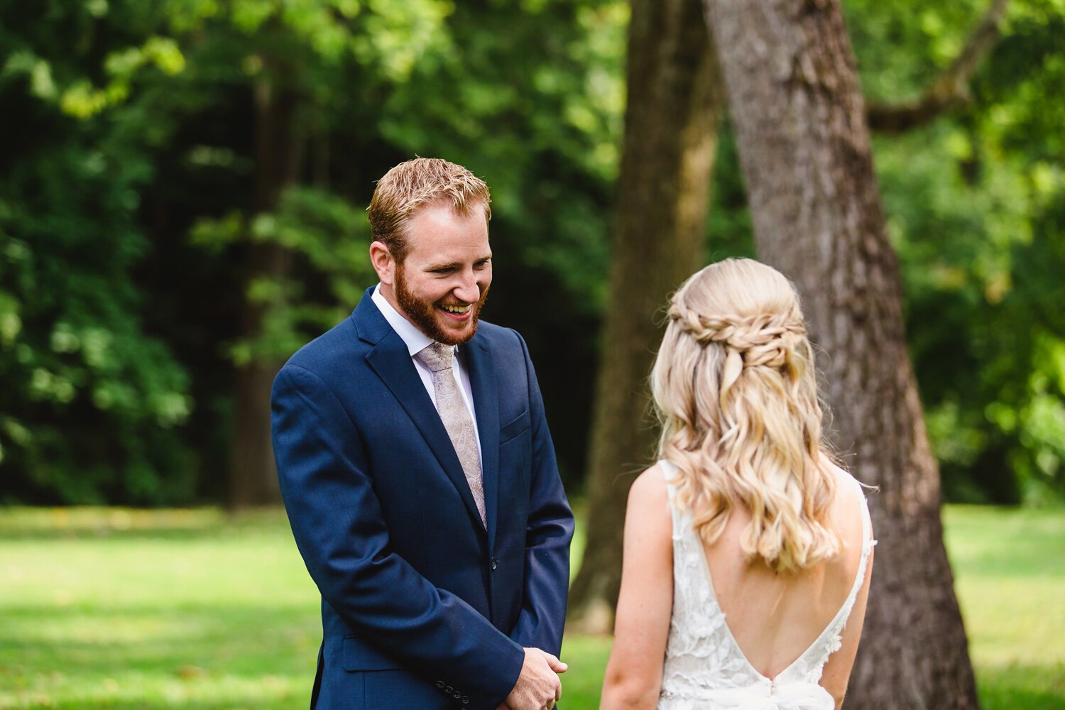 First look groom's reaction to bride