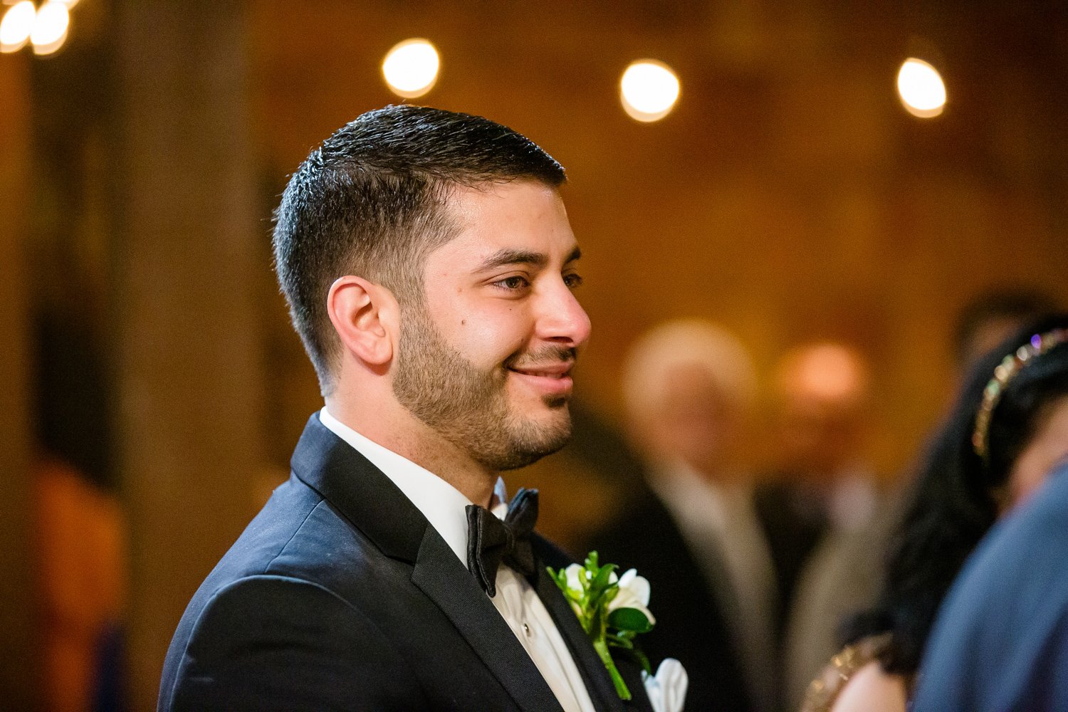 Grooms sees bride for first time at wedding ceremony