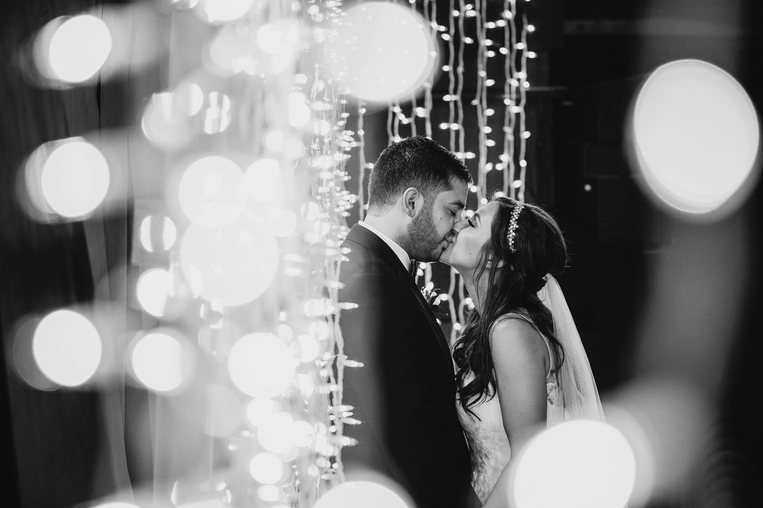 Peoria Illinois Wedding Photographer, bride and groom in string lights