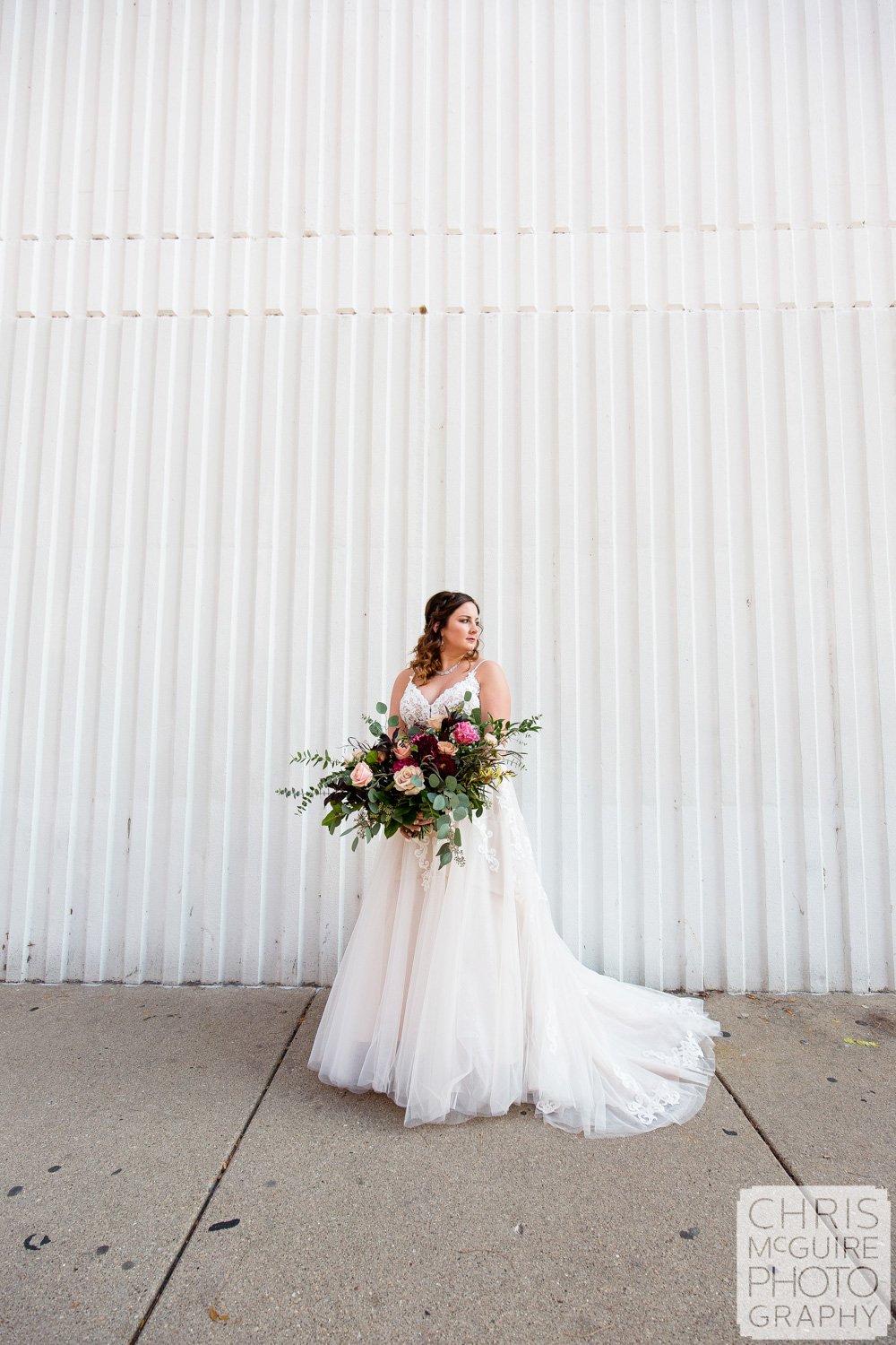 Bride with white wall in Peoria IL