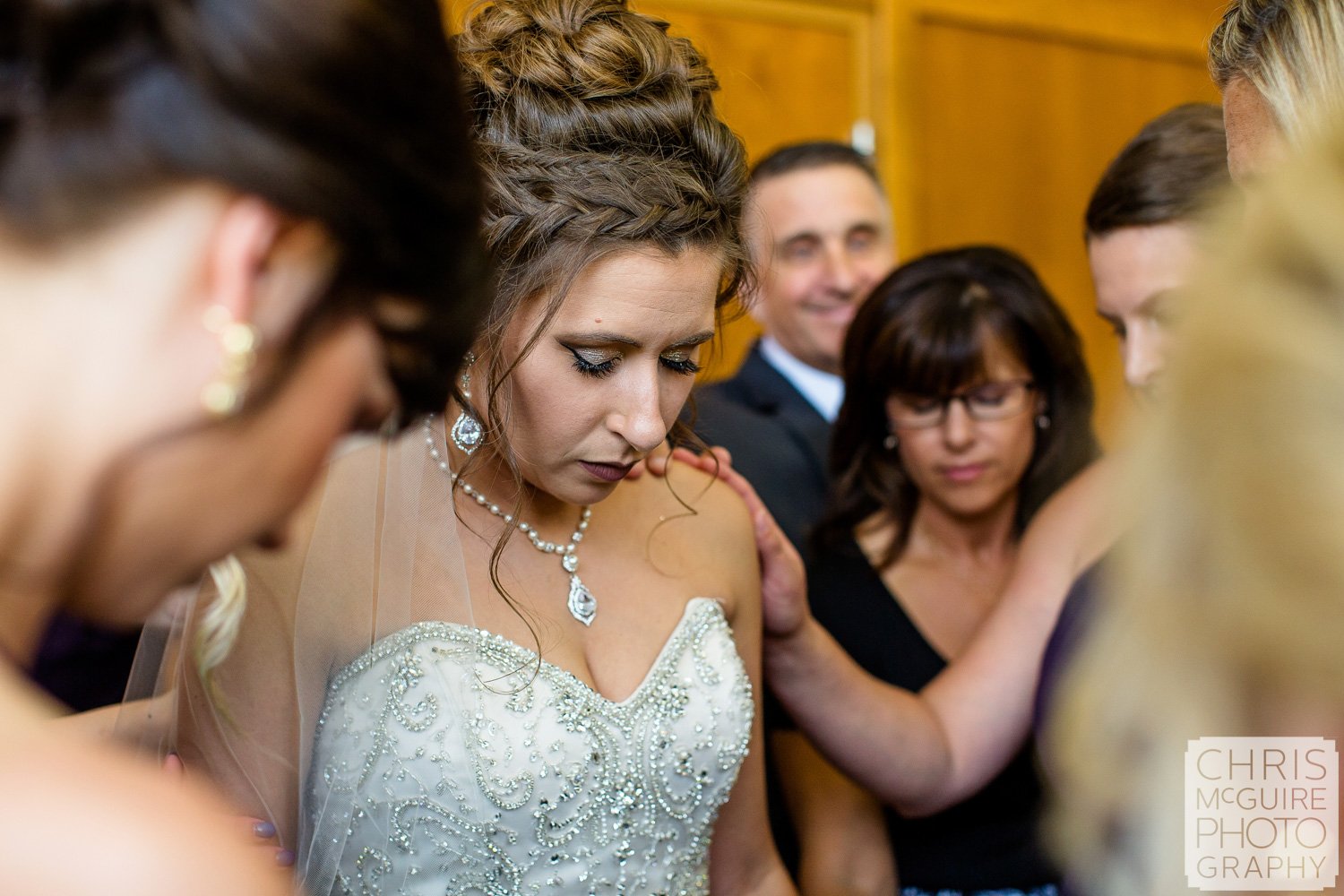 bride praying before wedding