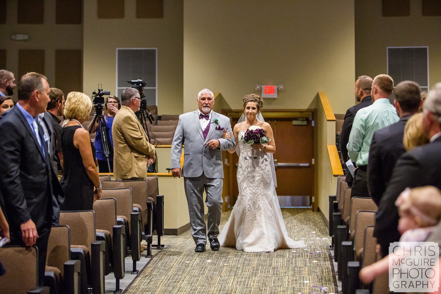 bride and father walking down asle at Peoria wedding