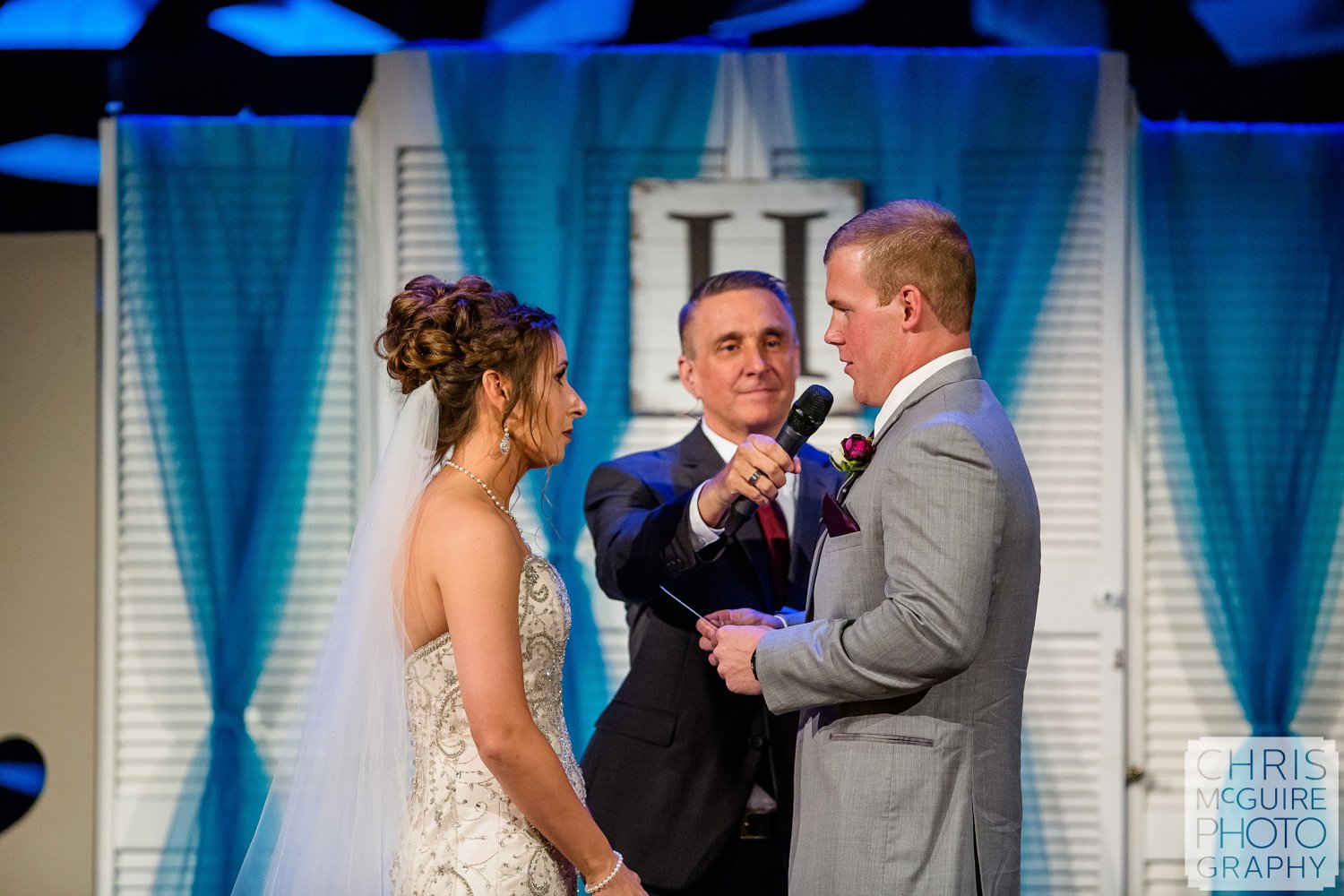 exchange of vows at Harvest Bible Chapel Peoria IL Wedding