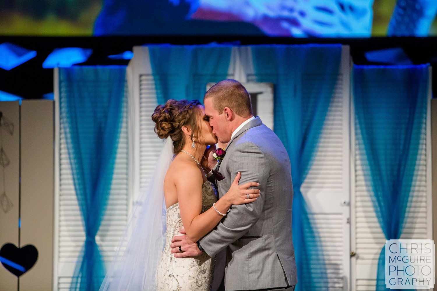 first kiss at Harvest Bible Chapel Peoria IL Wedding