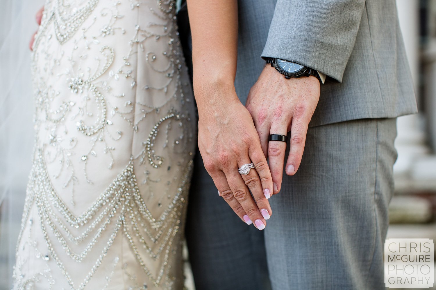 bride and groom with wedding rings