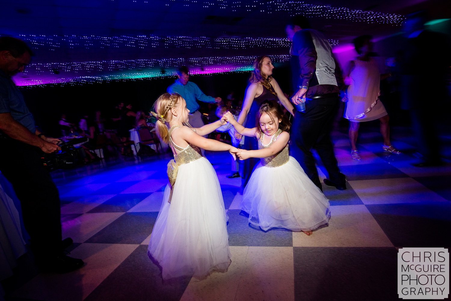 flower girls dancing at wedding reception