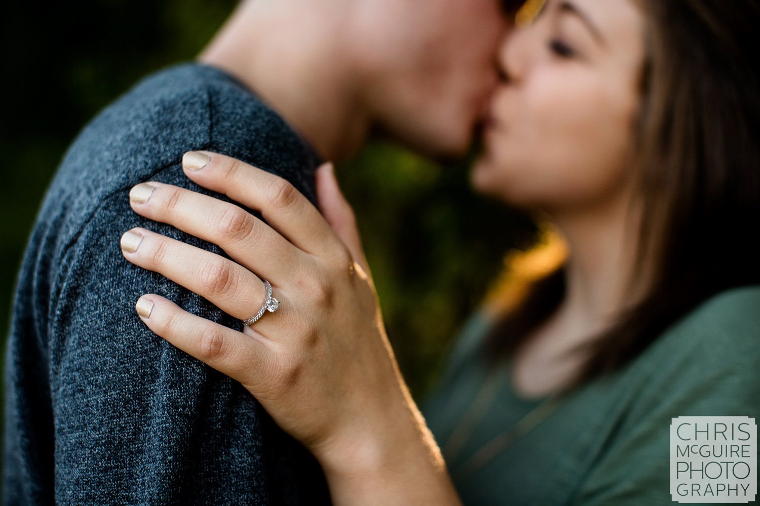 peoria engagement ring couple kissing