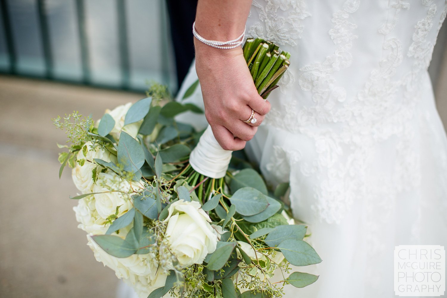 bridal bouquet and wedding ring