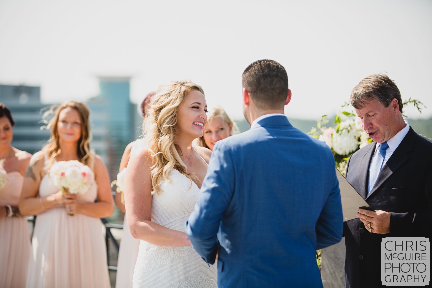 bride laughing during wedding vows