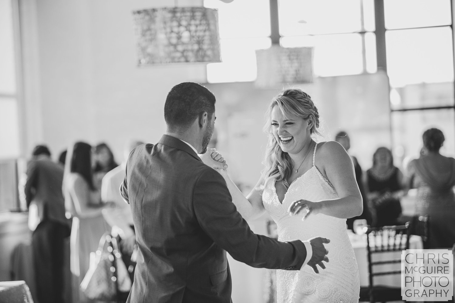 bride laughing during first dance