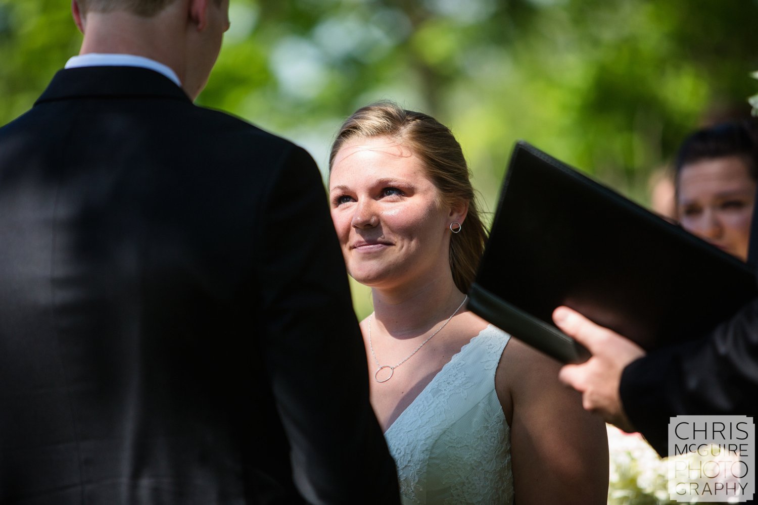 bride looking at groom during wedding