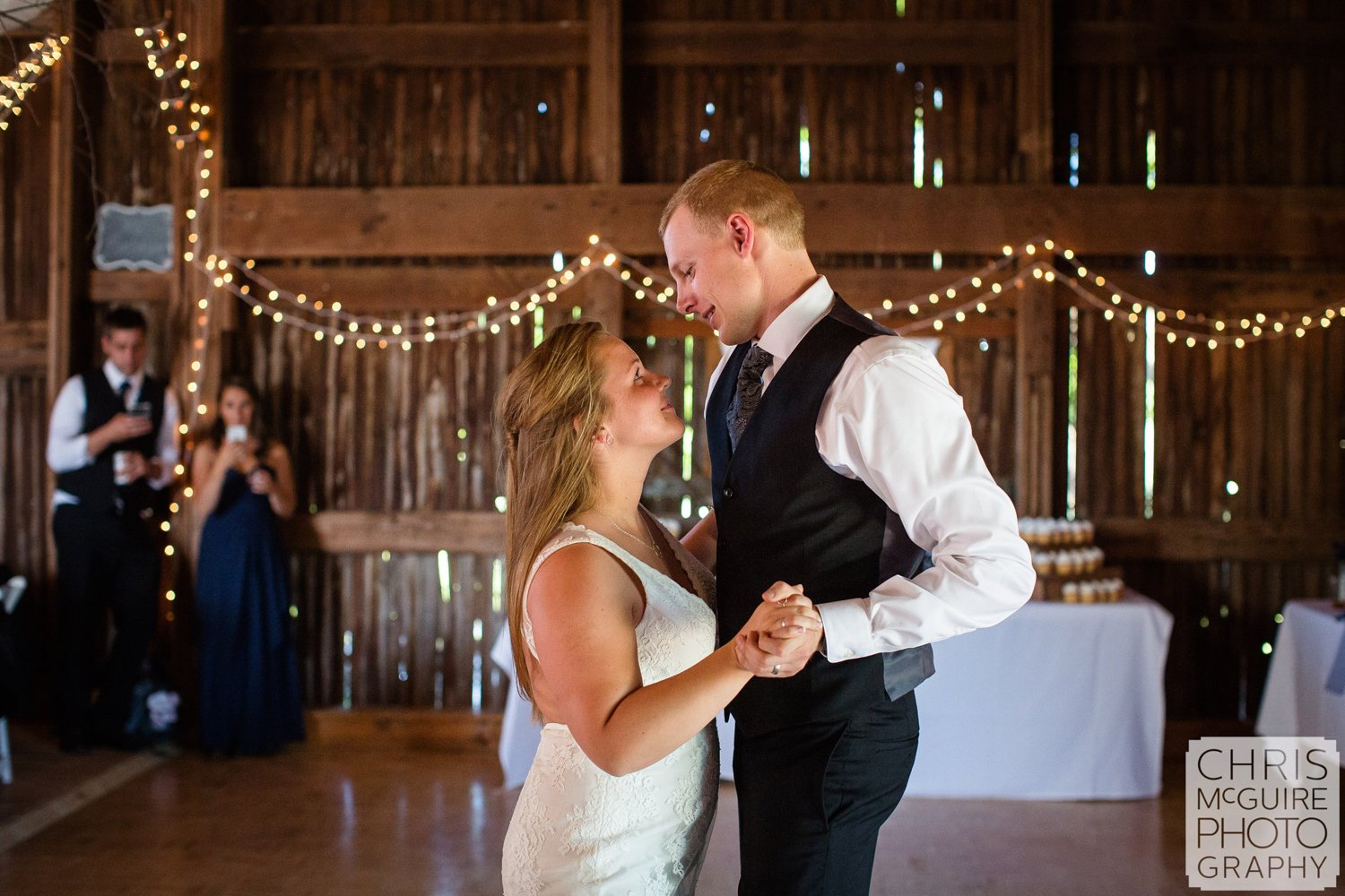 bride groom first dance in barn