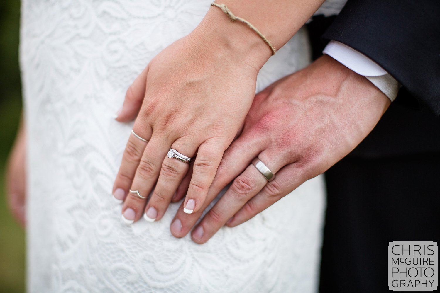 bride groom hands with rings