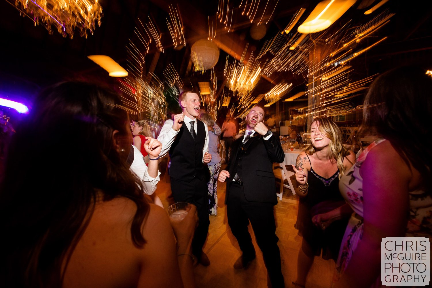 groom dancing at wedding