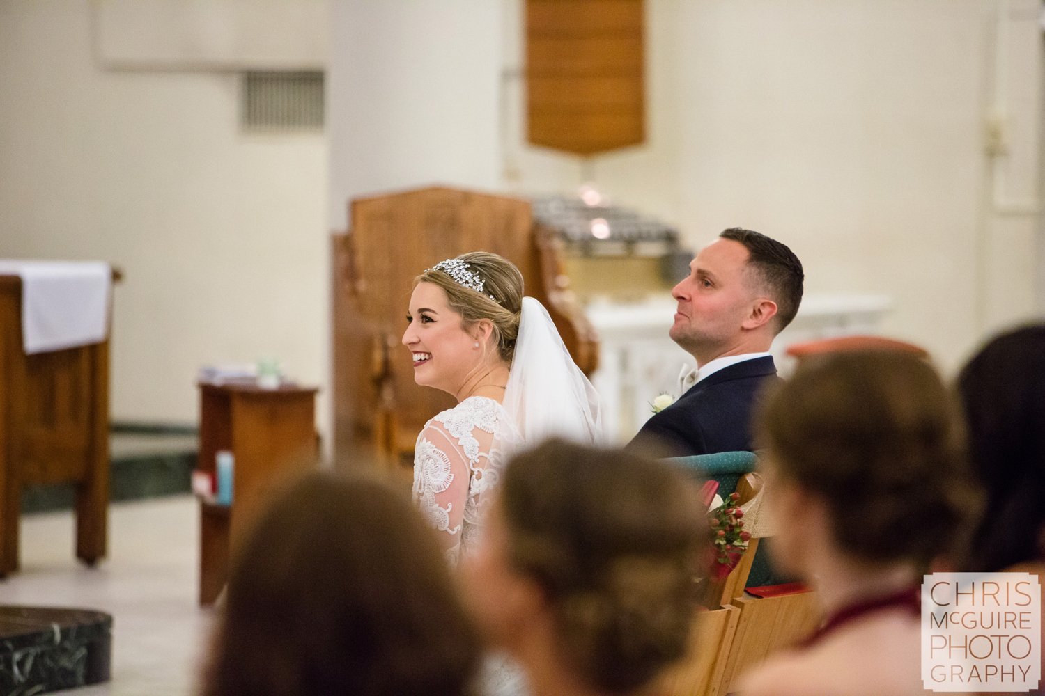 bride groom laughing during wedding