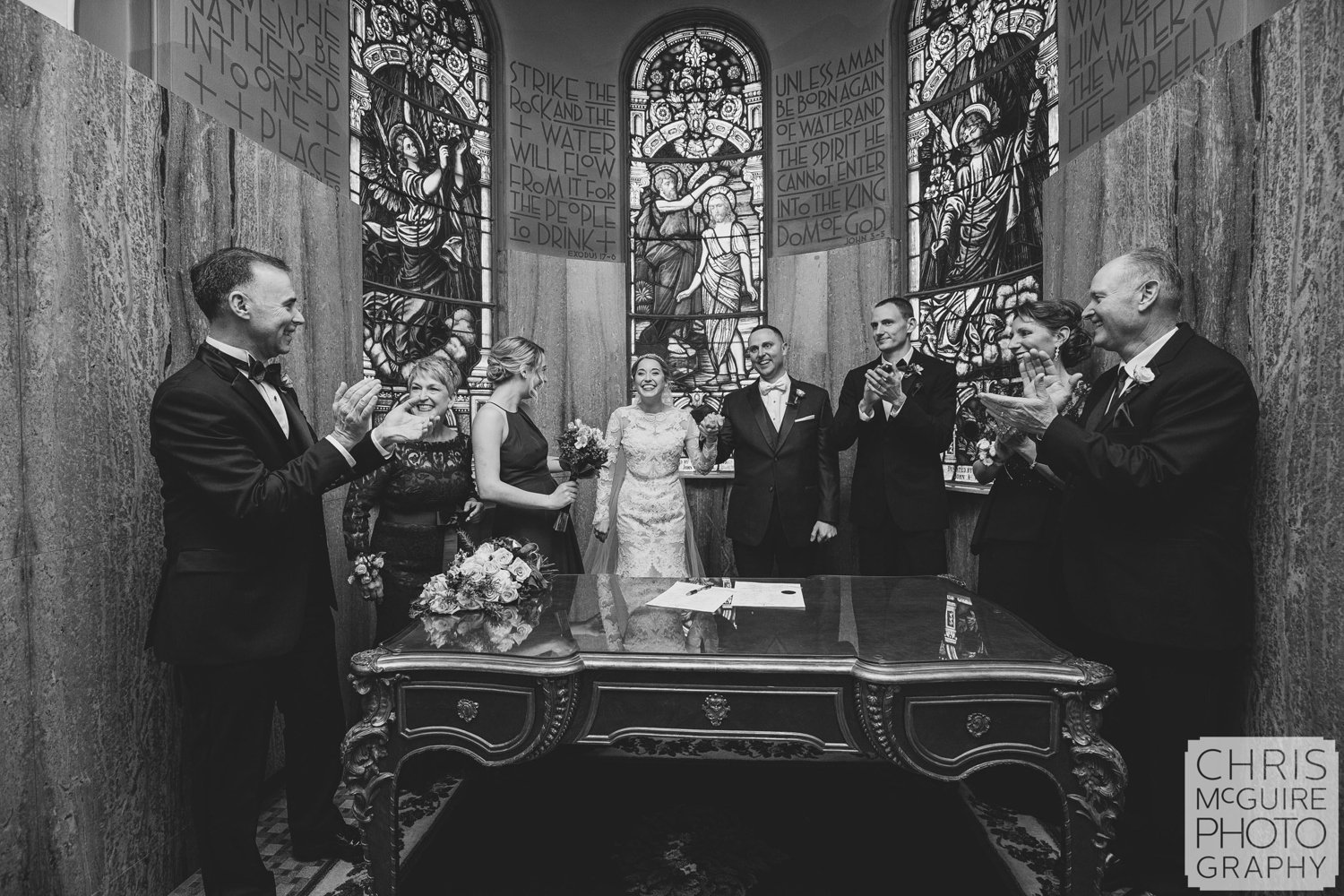 parents clapping for bride groom