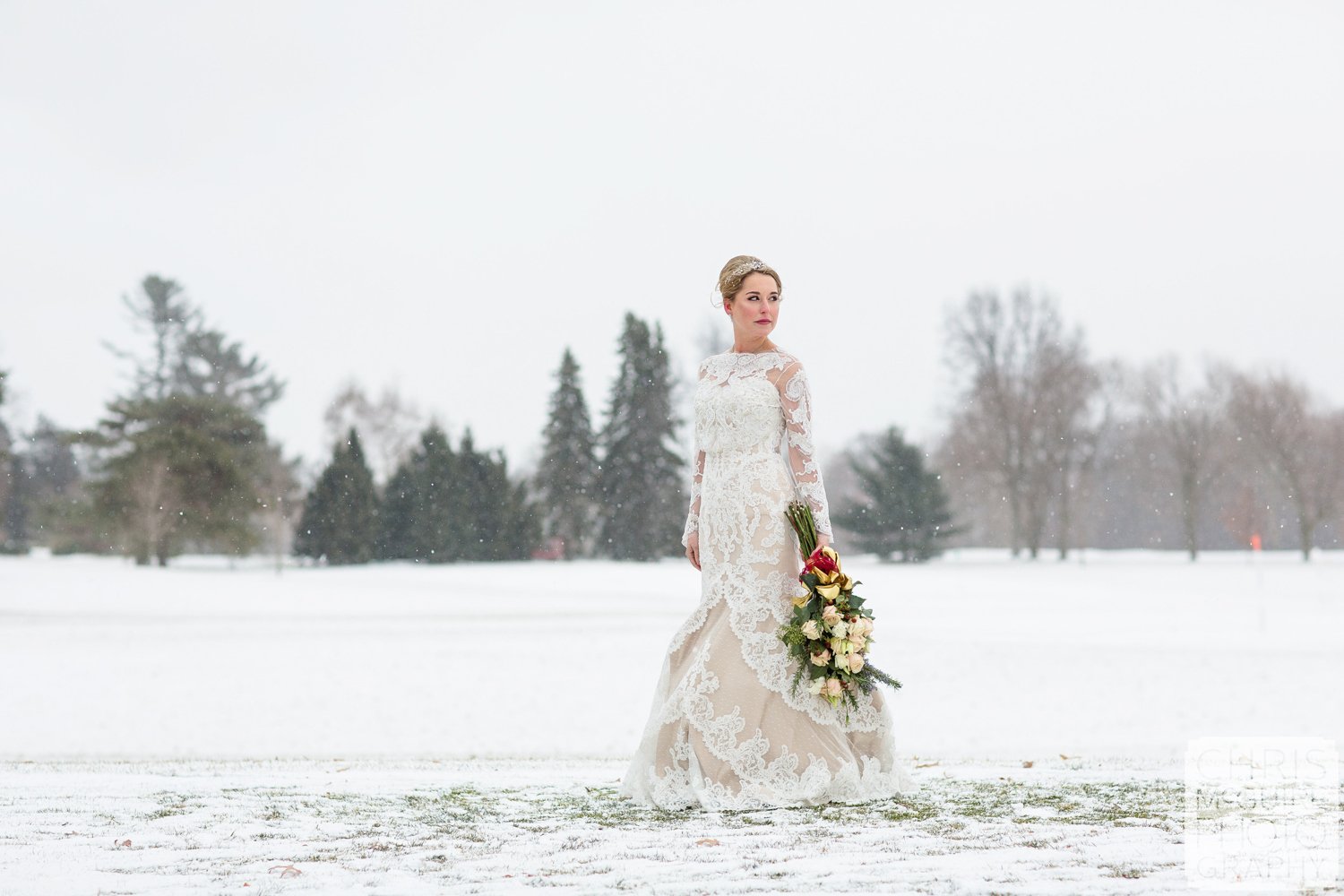 bride in snow winter wedding midwest