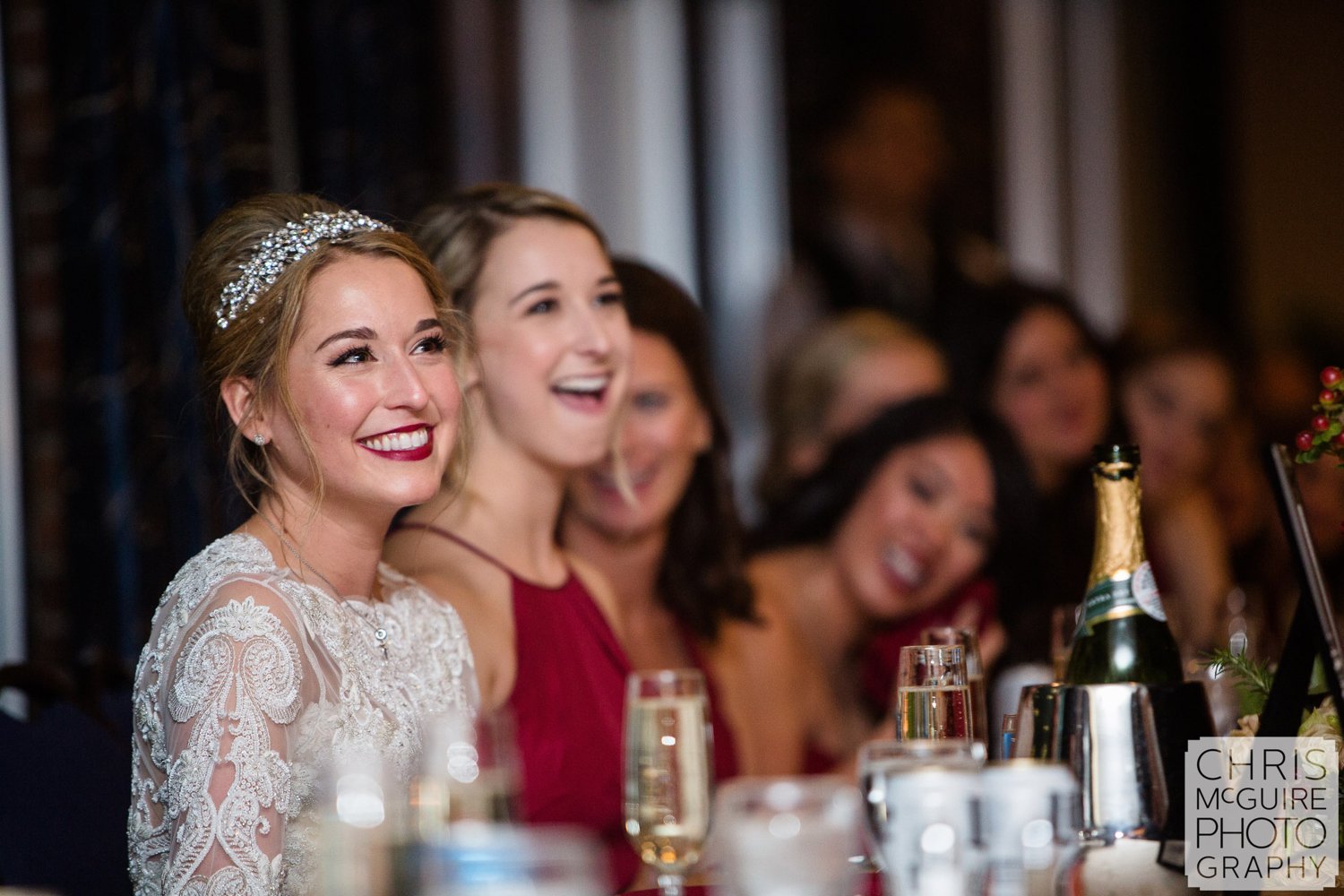 bride laughing during toast