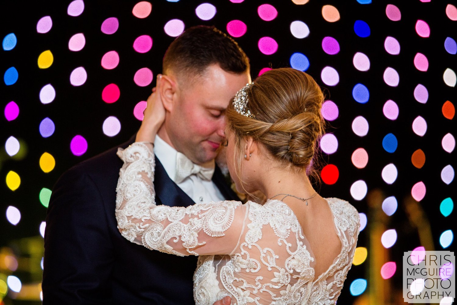 bride groom first dance colorful lights