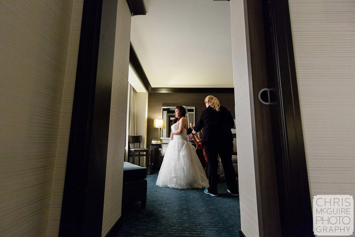 bride getting ready in hotel room