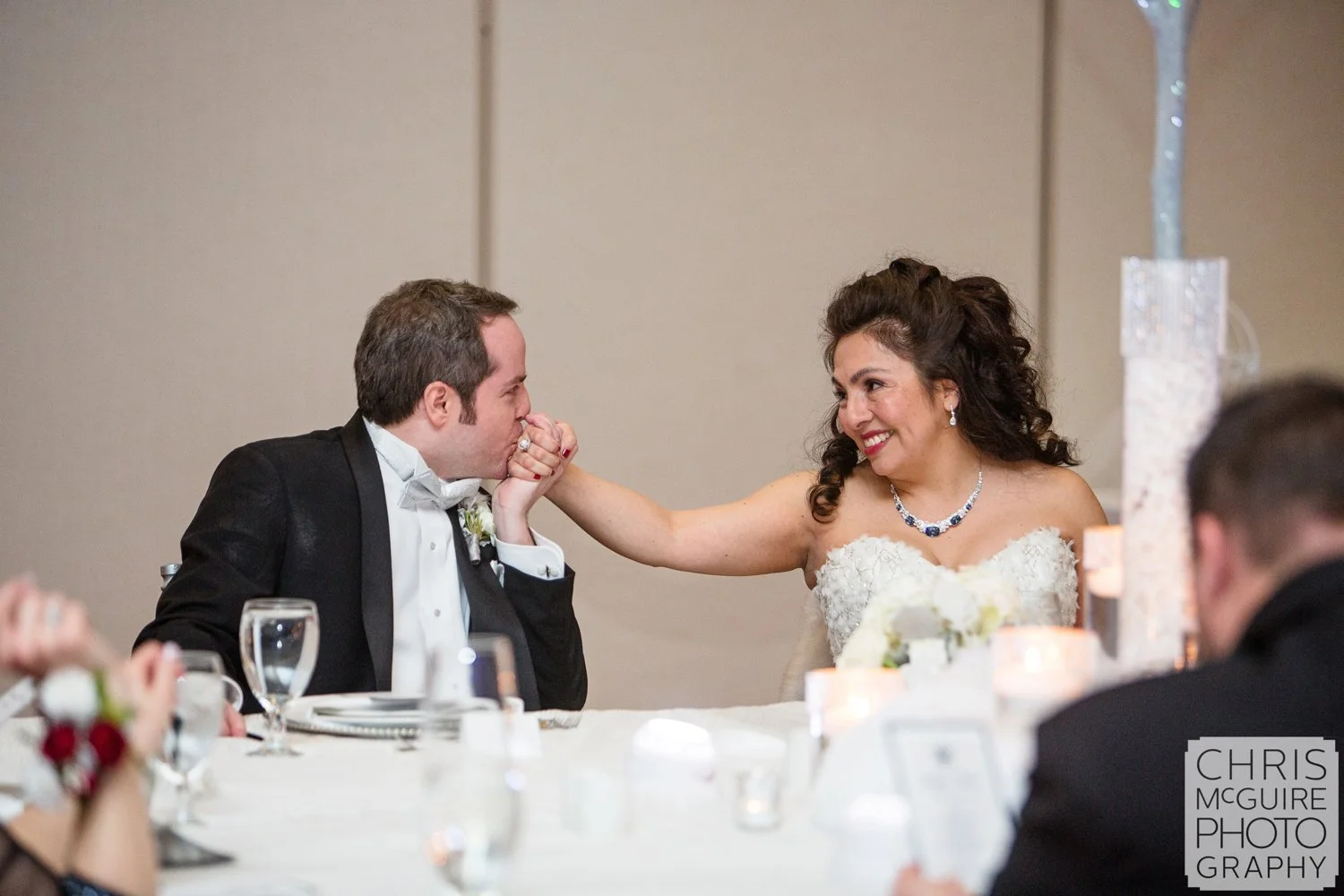 bride groom at reception table
