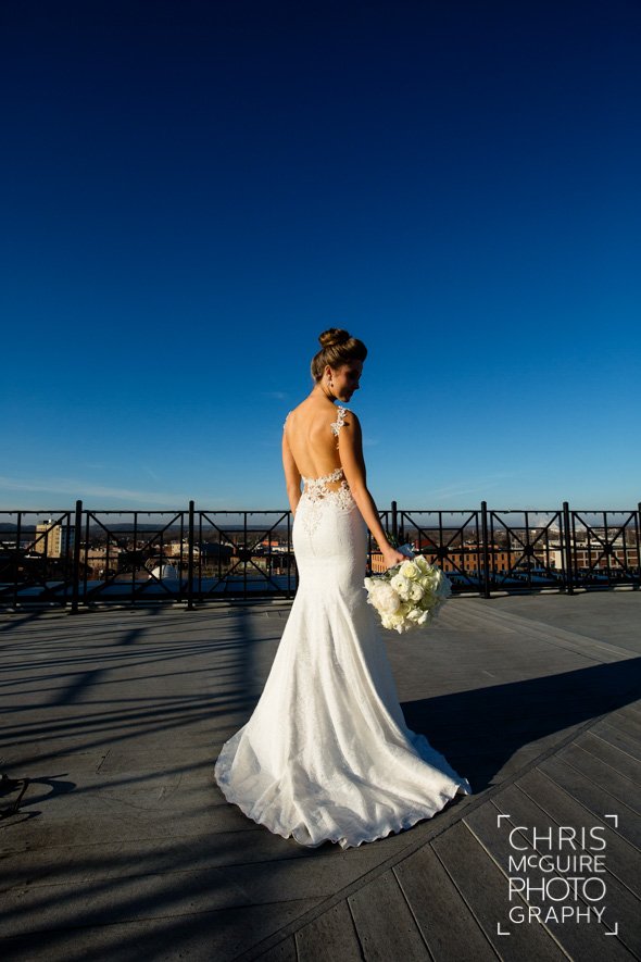bride in wedding dress on rooftop