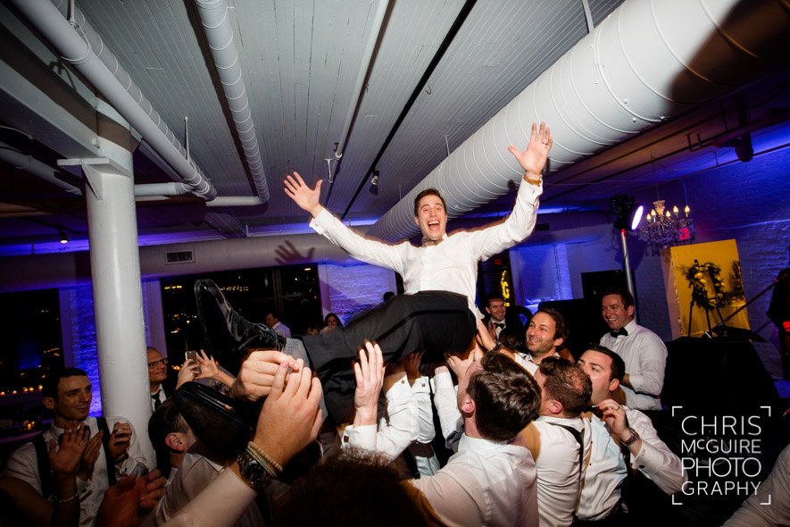 groom flying wedding dance