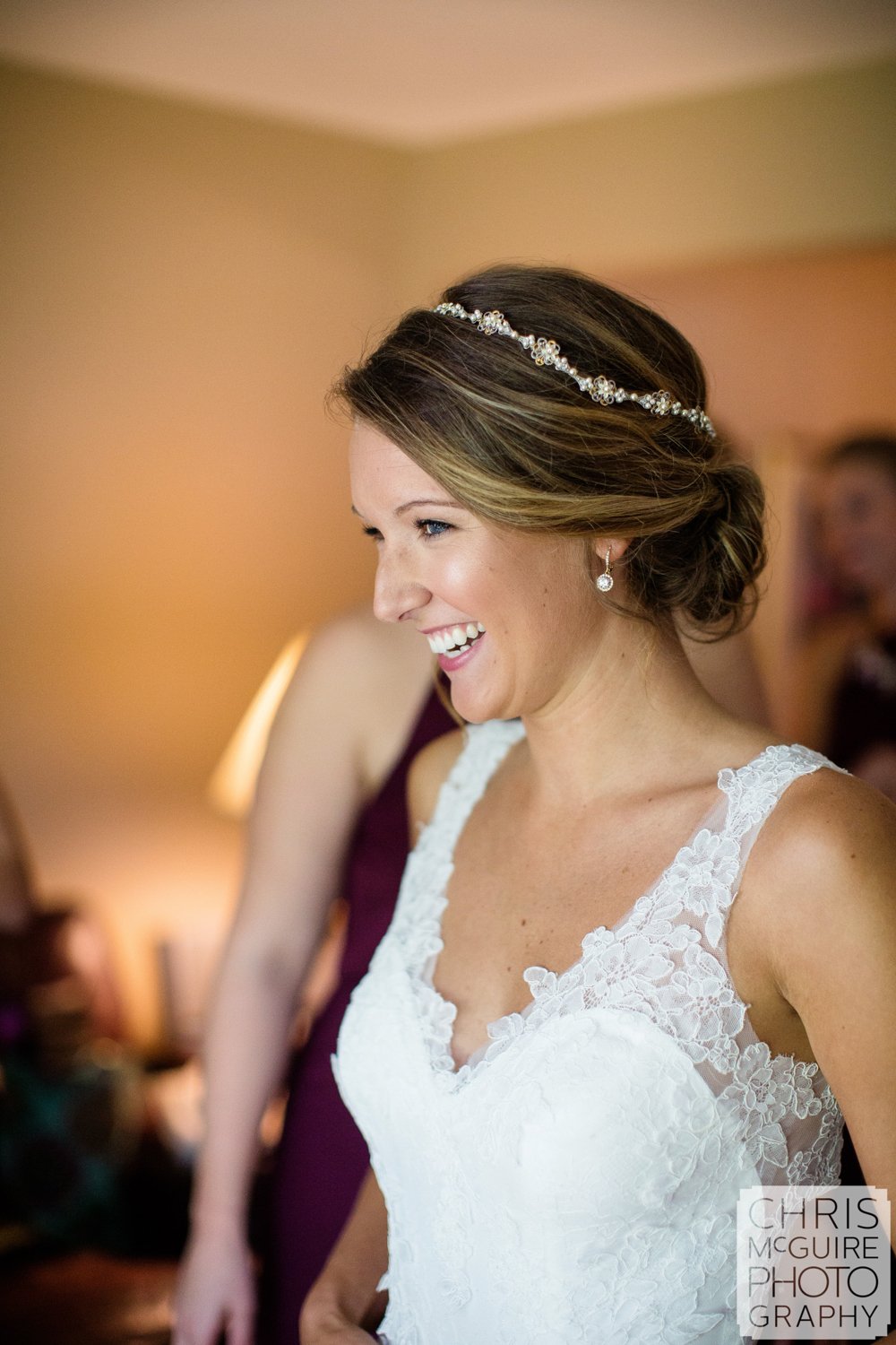 bride smiling while getting ready for central illinois wedding