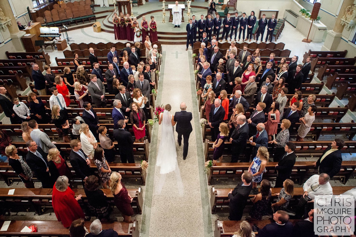 bride walking down aisle overhead