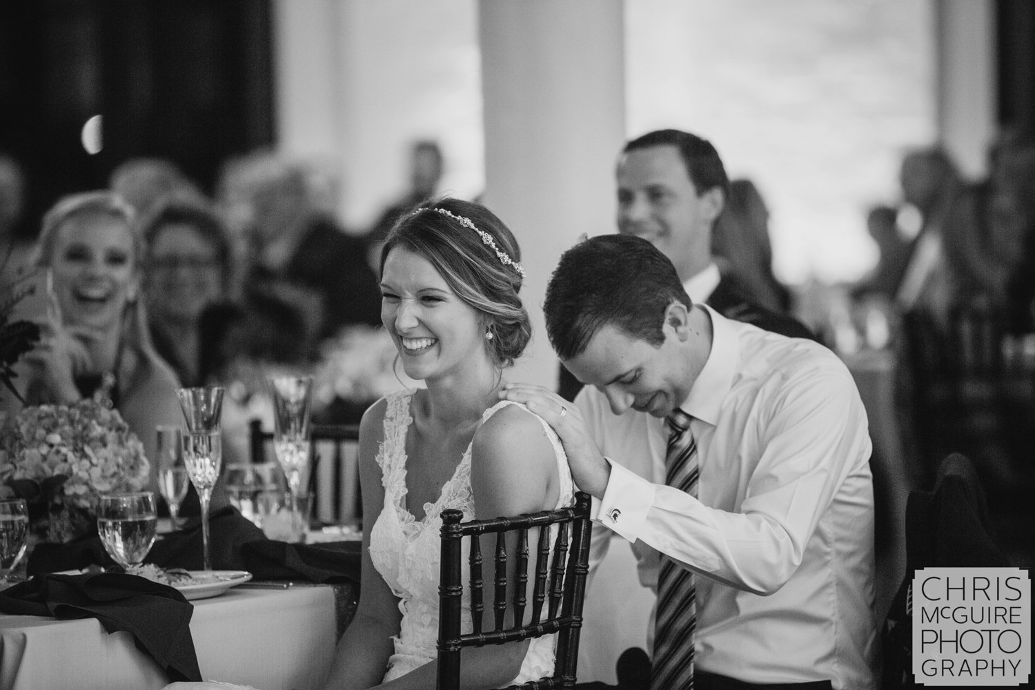 bride groom laughing during toast