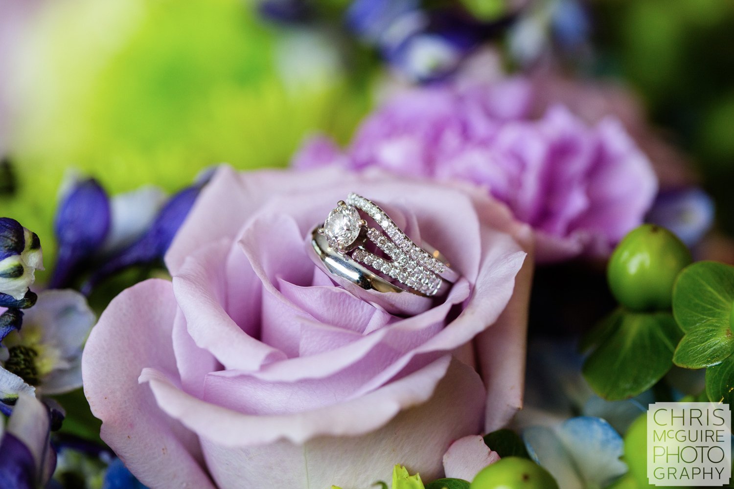 wedding rings with purple flowers