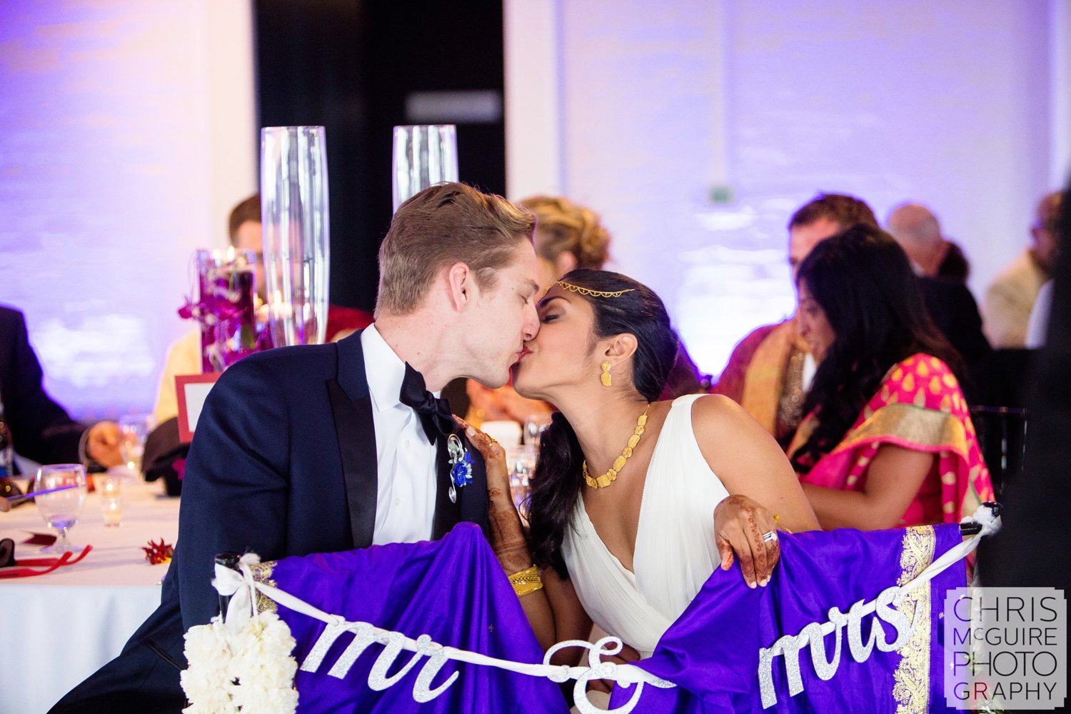bride groom kiss at wedding reception