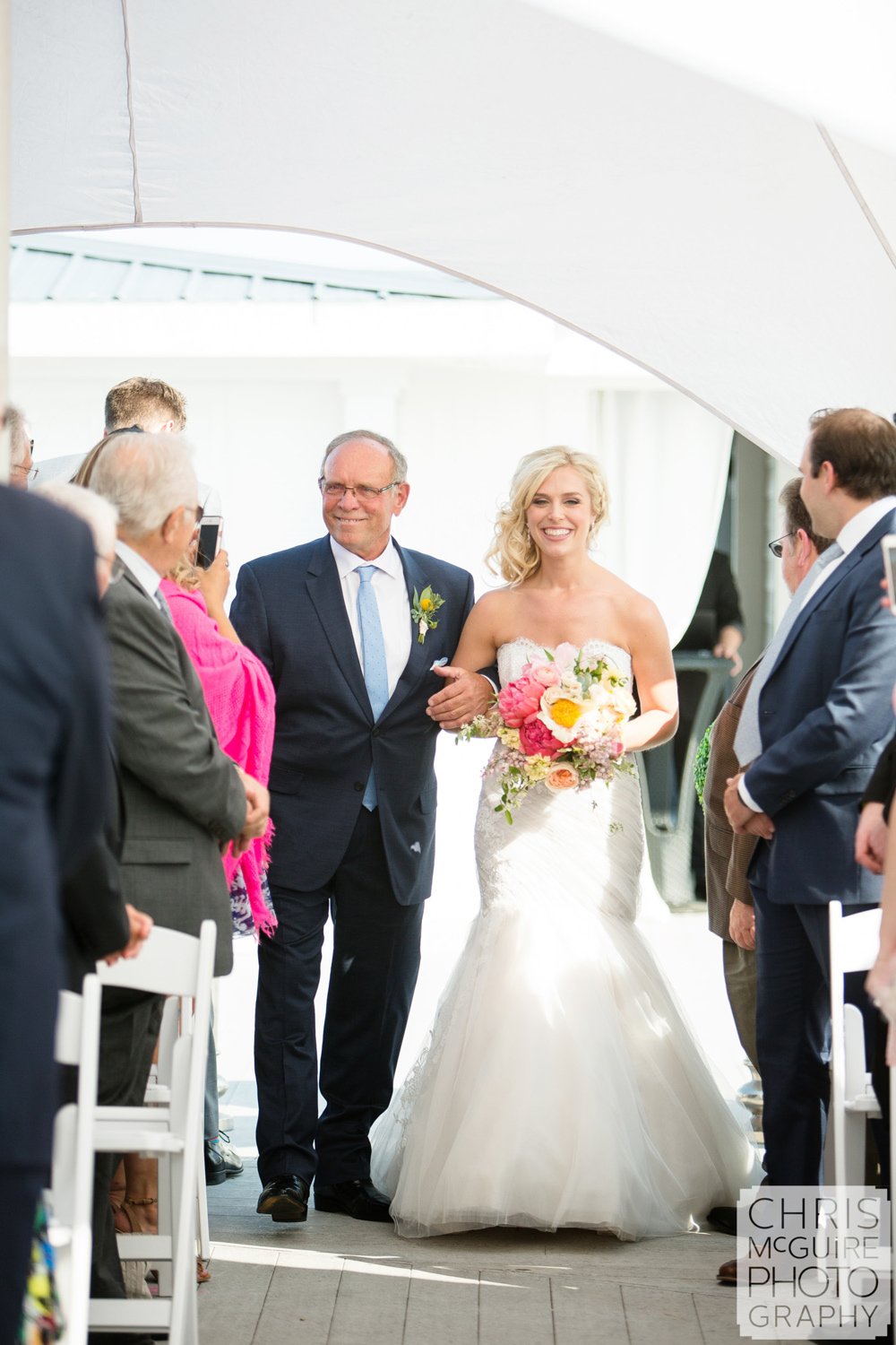 bride with father walking down aisle