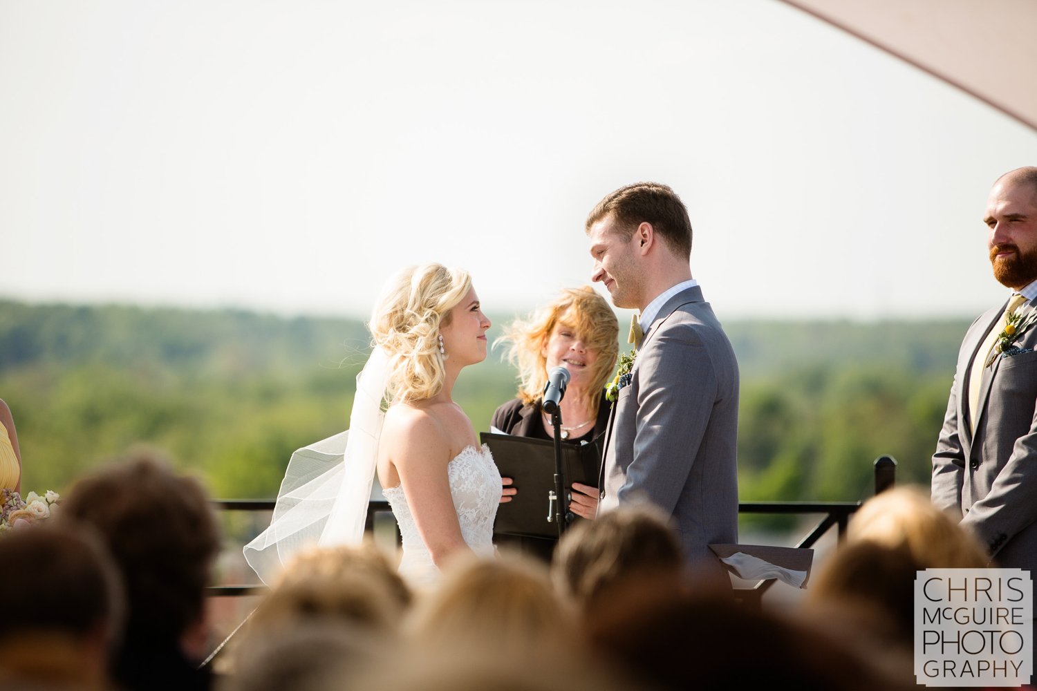 bride groom during wedding ceremony on rooftop