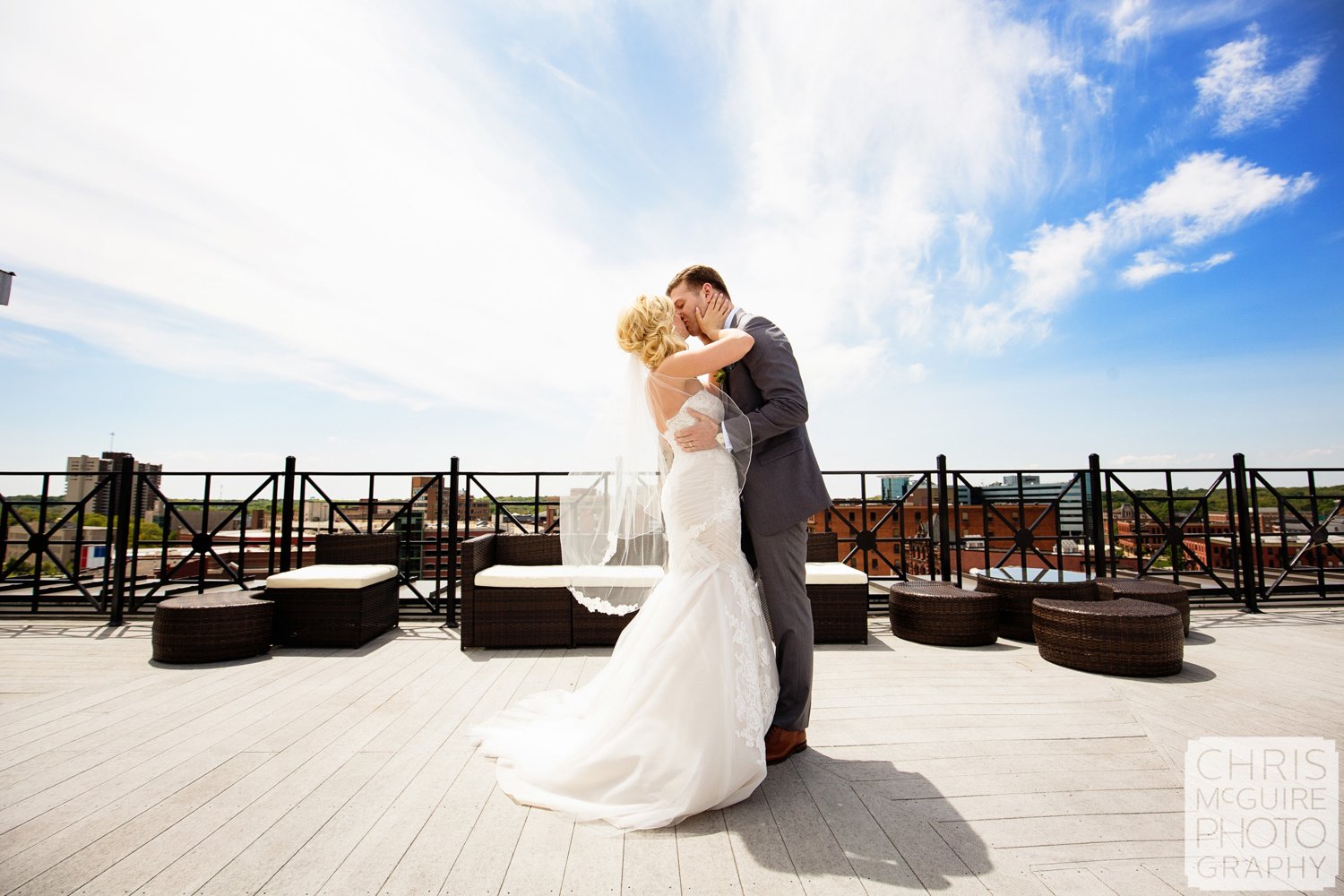 bride groom kiss on  roof