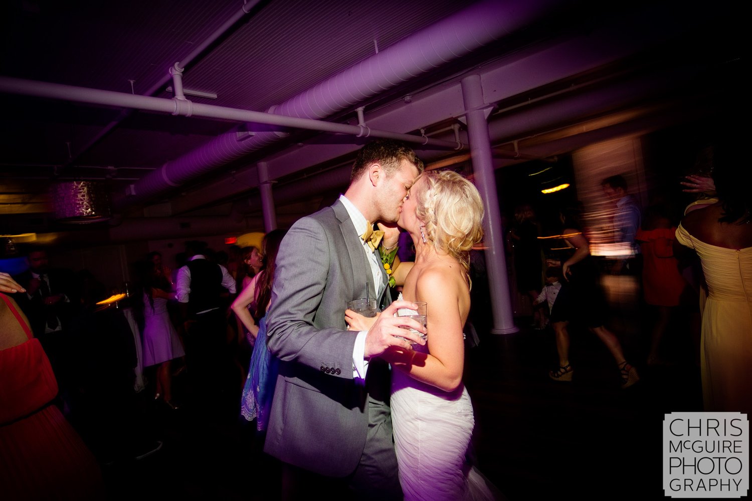 bride groom kiss on dancefloor