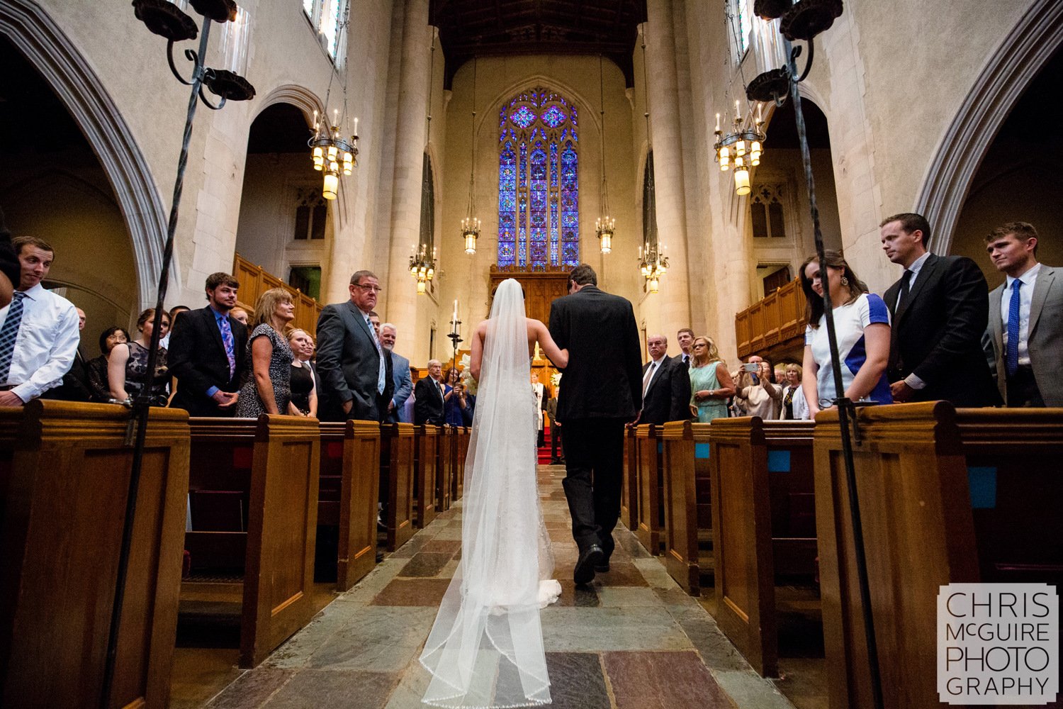 bride walking down aisle veil