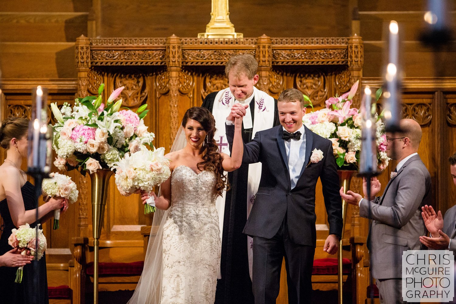 bride groom cheer at wedding