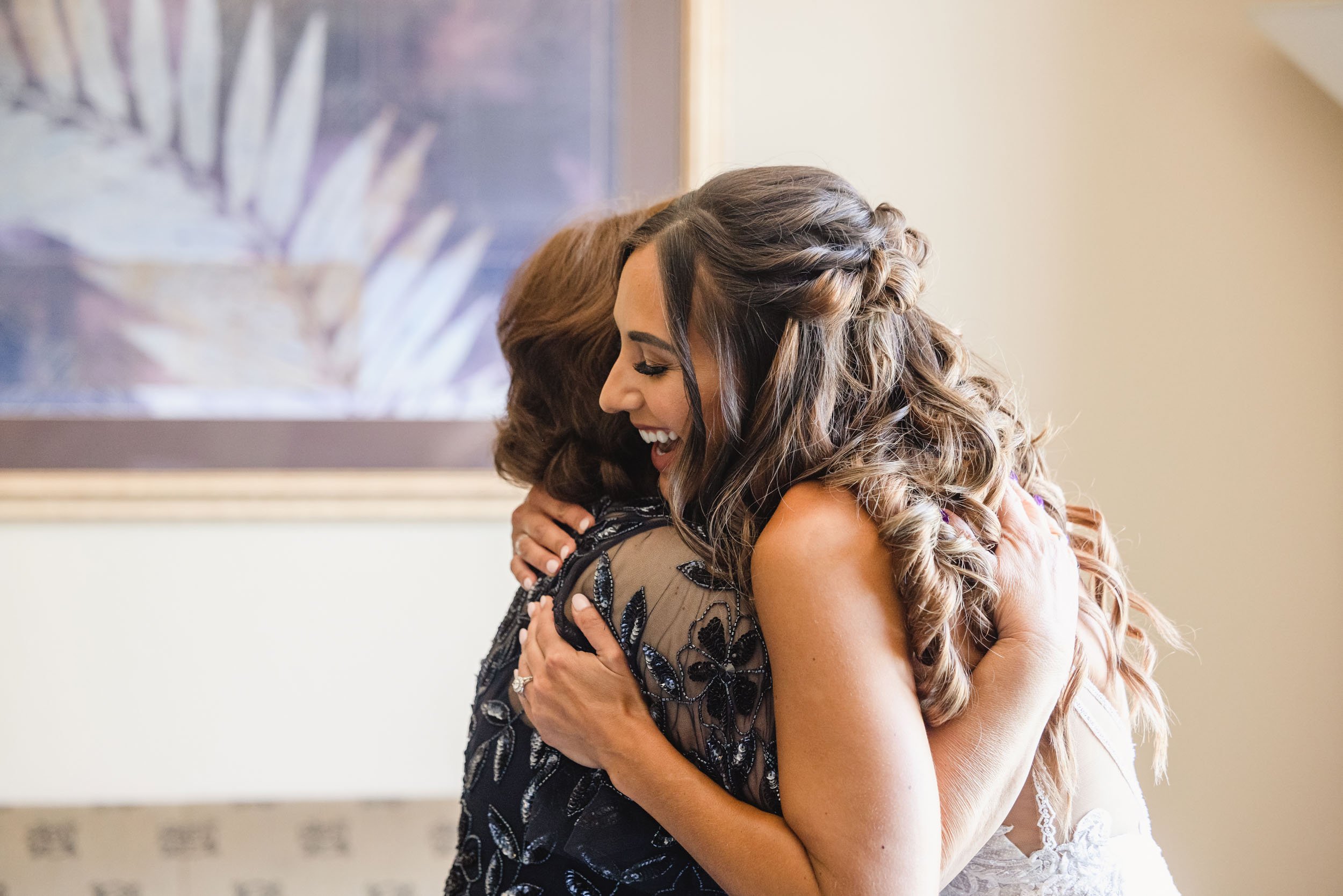 bride hugs mom